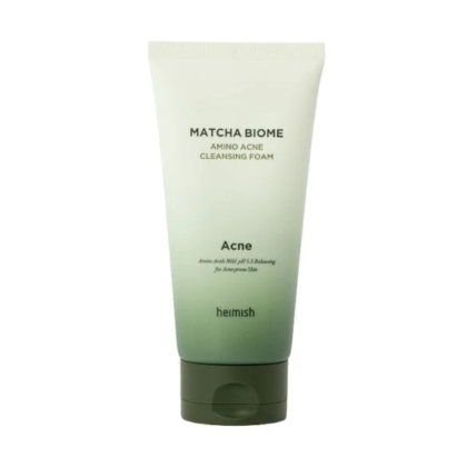 Un tube de 150 ml de Heimish Matcha Biome Amino Mousse Nettoyante Anti Imperfections, doté d'un design dégradé vert et d'un bouchon gris, adapté aux peaux à tendance acnéique et sensibles. Dakar
