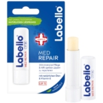 L'image présente un baume à lèvres Labello Soin des Lèvres Spf15 Med Repair avec un emballage bleu et blanc, mettant en valeur « soin intensif 24h » à la vitamine E. Le baume est partiellement débouché et le texte allemand met l'accent sur ses ingrédients naturels. Dakar