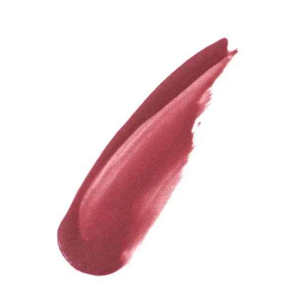 Un coup de pinceau de rouge à lèvres mauve profond, à la texture lisse et brillante, aux reflets légèrement métalliques. La couleur est vibrante et richement pigmentée. Dakar