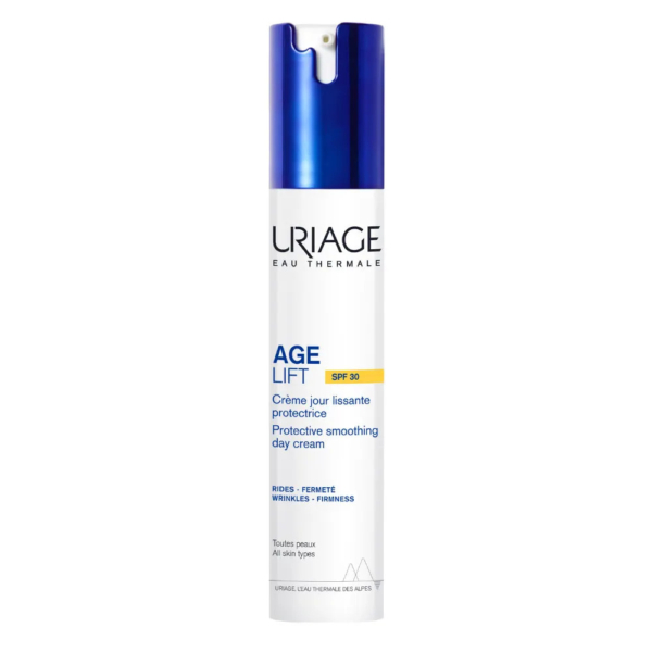 Un flacon de crème de jour Uriage Age Lift SPF 30 avec un bouchon pompe bleu. L'étiquette indique le nom du produit et ses bienfaits, tels que « Crème de jour protectrice et lissante » et « Rides – Fermeté ». Convient à tous les types de peau. Dakar
