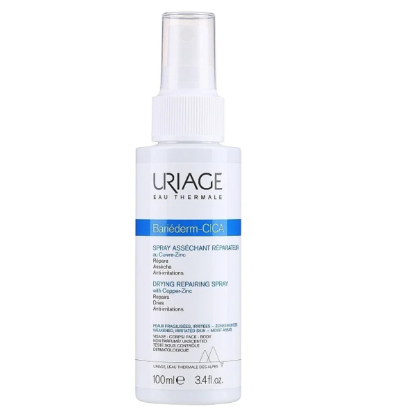 Un flacon pulvérisateur blanc de 100 ml portant l'étiquette « URIAGE » et « Bariéderm-CICA » en bleu. Il est décrit comme un spray réparateur asséchant utilisant la technologie Cu-Zn. Le flacon est fermé par un bouchon transparent. Dakar