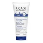 Tube de 200 ml de Baume Huile Apaisant Anti-Grattage Uriage Bébé 1er. L'emballage, blanc à dominante bleue, arbore une illustration d'ourson et des informations produit en anglais et en français. Dakar