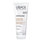 Un tube de Crème Moussante Nettoyante Éclat Uriage Dépiderm à la Vitamine C, conçu pour les teints ternes et tous types de peaux. Ce tube blanc avec inscriptions noires et orange contient 100 ml. Dakar