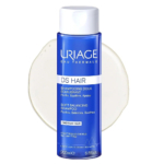 Flacon bleu de Shampooing Doux Équilibrant Eau Thermale DS Hair d'Uriage sur fond blanc. L'étiquette indique qu'il purifie, équilibre et apaise tous types de cheveux. Le flacon contient 200 ml de produit. Dakar