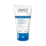 Tube de 50 ml de crème mains isolante et réparatrice Uriage Bariéderm-CICA, au design blanc et bleu. Le texte souligne ses propriétés protectrices, réparatrices et nourrissantes, enrichies en miel de Manuka. Dakar