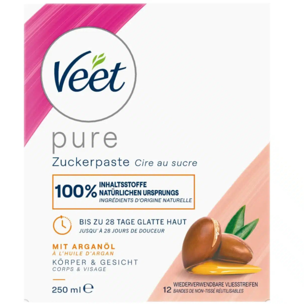 Emballage de la pâte de cire pure Veet au sucre et à l'huile d'argan, composée d'ingrédients naturels pour une peau douce jusqu'à 28 jours. La boîte contient également des noix d'argan et indique qu'elle convient au corps et au visage. Contient 12 bandes réutilisables. Contenance : 250 ml. Dakar