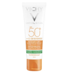 Un tube de crème solaire Vichy Capital Soleil SPF 50+. Son packaging met en valeur son soin matifiant quotidien 3-en-1 anti-brillance à l'argile verte et à l'extrait de biofus. Le tube, de couleur blanche dominante avec des touches d'orange, contient 50 ml. Dakar