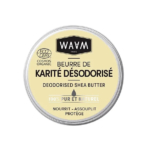 Boîte ronde de beurre de karité désodorisé WAAM Paris. L'étiquette est de couleur crème avec un texte noir et vert en français et en anglais, soulignant la certification biologique et la pureté du produit. Dakar