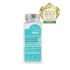 Un flacon d'exfoliant Magic Powders WAW, orné d'un sceau de récompense. L'étiquette indique « Nettoyant Visage Exfoliant Quotidien en Poudre » et « Facial Cleansing Powder Daily Exfoliator », avec zinc, aloe vera et guimauve. Contient 50 g, pour une utilisation de 2 mois. Dakar