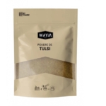 Un emballage beige étiqueté « WAAM Paris : Poudre de Tulsi » avec une section transparente laissant apparaître une poudre brune à l'intérieur. Le sachet est recyclable. Des pictogrammes d'application sont présents au fond. Dakar