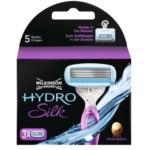 Le rasoir WILKINSON Lames Hydro Silk 3 pièces est doté d'un élégant manche bleu et violet, des inscriptions « 5 lames » et « Beurre de karité », ainsi que d'une image du rasoir sous la douche et d'un texte en anglais et en allemand. Il est livré avec 3 cartouches pour un rasage sans effort. Dakar