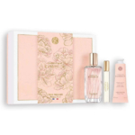 Coffret parfum « Comme une Évidence » d'Yves Rocher. Il comprend un coffret floral, un flacon de parfum, un petit parfum de voyage et un tube de lait pour le corps, soigneusement agencés dans des tons rose pâle et doré. Dakar