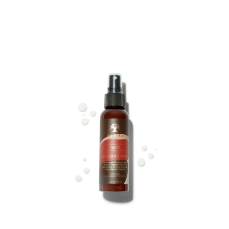 Un flacon pulvérisateur marron étiqueté « Asiam Spray contre la Cocoshea 120 ml » est placé au centre sur un fond blanc, avec de petites gouttes de liquide à proximité. Ce spray hydrate et rafraîchit les cheveux sans rinçage. Dakar