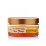 Un petit pot rond de Crème of Nature Pure Honey Gel edge control Anti-Frisottis et sans Résidus 63,7g, pour le contrôle de l'hydratation et des frisottis, avec un couvercle doré et un gel orange à l'intérieur, idéal pour les cheveux secs ou déshydratés. Dakar