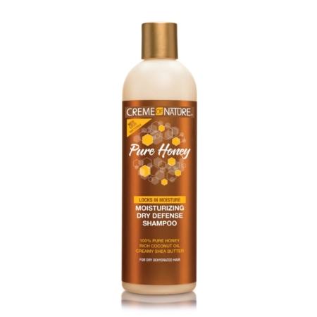 Un flacon de 355 ml de Crème of Nature Pure Honey Shampooing Hydratant à Base de miel et d'Huile de Noix de Coco, avec un bouchon doré et une étiquette marron pour les cheveux secs. Dakar