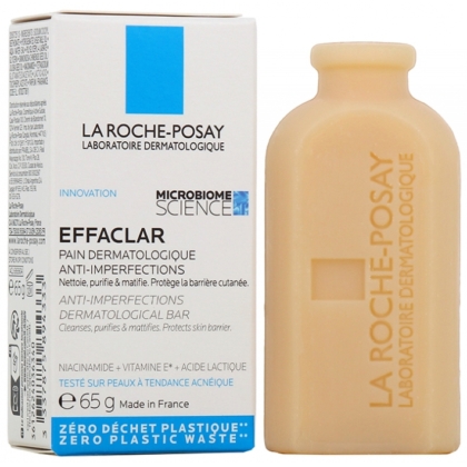 Le pain La Roche Posay Effaclar Pain Dermatologique Anti Imperfections 65 g est présenté à côté de sa boîte blanche et bleue, mettant l'accent sur le « zéro déchet plastique » et « anti-imperfections » pour une solution de soin douce et écologique. Dakar