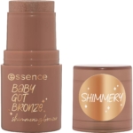 Le Stick Bronzeur Scintillant Parfumé Noix Coco Eclat Estival 5,5 g d'Essence Cosmetics est présenté sans capuchon, le capuchon affichant « Shimmery » en paillettes dorées, parfait pour devenir votre nouveau bâton de poudre bronzante préféré. Dakar