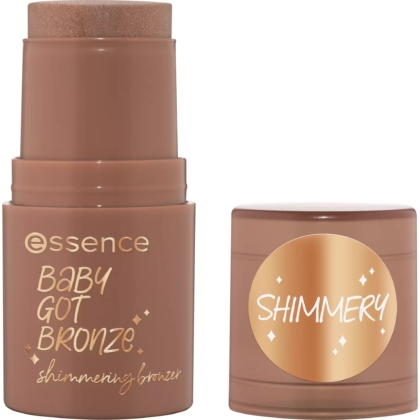 Le Stick Bronzeur Scintillant Parfumé Noix Coco Eclat Estival 5,5 g d'Essence Cosmetics est présenté sans capuchon, le capuchon affichant « Shimmery » en paillettes dorées, parfait pour devenir votre nouveau bâton de poudre bronzante préféré. Dakar