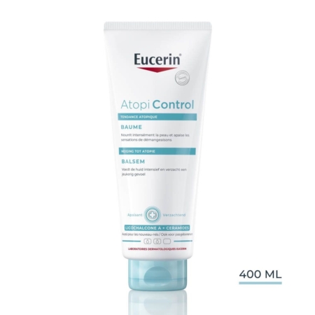 Un tube blanc de 400 ml d'Eucerin AtopiControl Baume Peau à Tendance Atopique, avec des accents bleus et rouges avec du texte français et néerlandais pour les soins de la peau atopique. Dakar