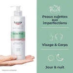 Une main tient un flacon d'Eucerin DermoPure Gel Nettoyant Triple Action Visage et Corps 400 ml. Le texte français souligne son utilisation pour les peaux à imperfections, convient au visage et au corps, parfait pour les routines de jour et de nuit. Dakar