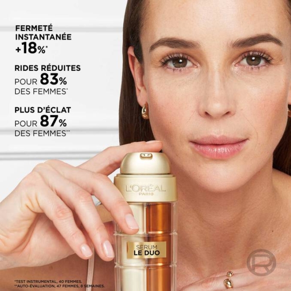 Une femme à la peau claire porte le Sérum Anti-Âge L'Oréal Age Perfect Le Duo Fermeté Instantanée Anti-Rides et Éclat 30 ml. Le texte indique : +18 % de fermeté instantanée, rides atténuées pour 83 % et éclat accru pour 87 % des femmes. Dakar
