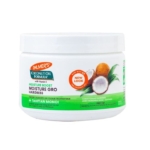 Un pot blanc de Palmer's Coconut Air Moisture Gro Hairdress 250 g. L'étiquette présente des noix de coco et indique que ce produit est destiné aux cheveux secs, abîmés ou colorés, comme la crème hydratante capillaire Evashair. Dakar