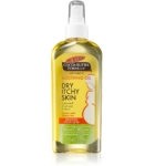 Un flacon pulvérisateur de 150 ml d'huile pour le corps Palmer's Pregnancy Cocoa Butter Formula, conçu pour les peaux sèches et qui démangent avec de la vitamine E et présentant une illustration de ventre de femme enceinte sur l'étiquette. Dakar