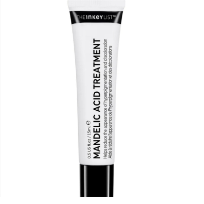 Un tube blanc étiqueté « The Inkey Traitement à l'Acide Mandélique Anti Imperfections 15 ml » avec un texte noir se dresse debout sur un fond blanc, idéal pour des soins ciblés de la peau. Dakar