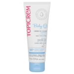 Un tube blanc de Topicrem Bébé Crème de Change Barrière 75 ml avec du texte rose, bleu et gris, une icône de visage de bébé et des détails français/anglais. Fabriqué en France. Associez-le à Topicrem Bébé Soin Croûtes de Lait pour un soin complet de bébé. Dakar