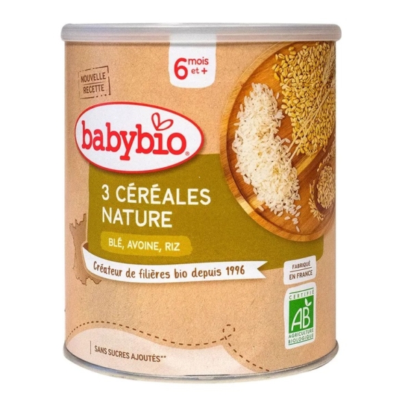 Babybio 3 Céréales Nature 6 Mois et + Bio 220 g associe blé, avoine et riz pour bébé à partir de 6 mois. L'étiquette montre des céréales et un sceau biologique. Pour plus d'options, essayez Babybio 5 Céréales Verveine Fleur d'Oranger Camomille. Dakar