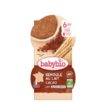 Une boîte de babybio Desserts Lactés Bébé Semoule au Lait Fleur d'Oranger 2x100g pour les bébés à partir de 6 mois, avec une image du produit, du blé, de la fleur d'oranger, et des étiquettes indiquant qu'il s'agit d'un produit biologique et fabriqué en France. Dakar