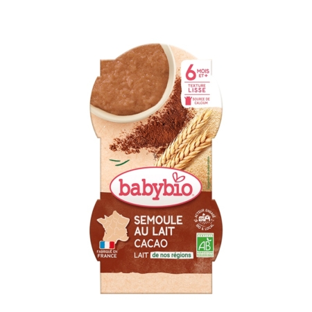 Une boîte de babybio Desserts Lactés Bébé Semoule au Lait Fleur d'Oranger 2x100g pour les bébés à partir de 6 mois, avec une image du produit, du blé, de la fleur d'oranger, et des étiquettes indiquant qu'il s'agit d'un produit biologique et fabriqué en France. Dakar