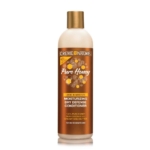 Une bouteille de 340 g de Crème Of Nature Pure Honey Après Shampoing Hydratant et Démêlant Cheveux Secs, avec une étiquette marron et or présentant des graphiques en nid d'abeille et mettant en valeur le miel, l'huile de coco et le beurre de karité pour les cheveux secs. Dakar