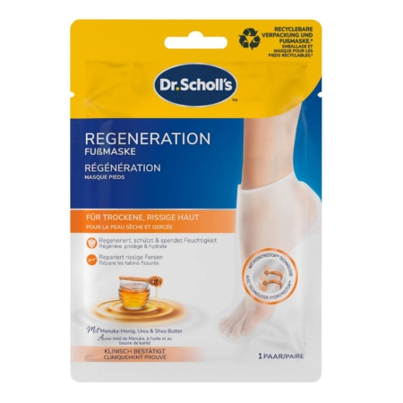 L'emballage du « Dr. Scholl Expert Care Masque Pieds Nourrissant 1 Paire » représente un pied, met en avant son action apaisante sur la peau sèche et gercée grâce au miel de Manuka, à l'urée et au beurre de karité, et comporte des informations en allemand et en français. Dakar