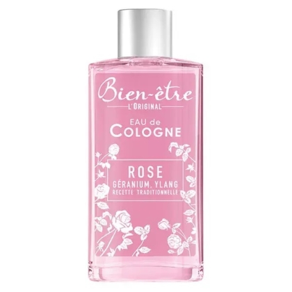 Un flacon rose de 250 ml de L'Original Eau de Cologne Rose, orné de motifs floraux blancs et d'un bouchon argenté. Le texte sur le flacon met en avant le géranium et l'ylang comme notes principales. Dakar