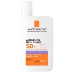 Un flacon blanc de La Roche-Posay Anthelios UVmune 400 Fluide Anti-Taches SPF 50+ Sans Parfum 50 ml avec un texte orange et bleu se tient debout, offrant une haute protection UVA et un soin anti-taches sur un fond uni. Dakar