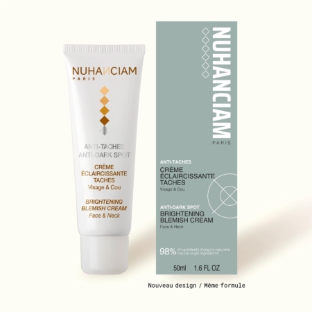 Un tube et une boîte de Nuhanciam Crème Éclaircissante Anti Taches Visage 50 ml avec un emballage blanc minimaliste français et anglais pour le visage et le cou, présentés sur un fond clair. Dakar