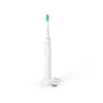 Une brosse à dents électrique Philips Sonicare Blanche Modèle 2100 HX3651/13 se tient debout sur une base de chargement blanche, avec son câble de chargement attaché visible sur un fond blanc propre. Dakar