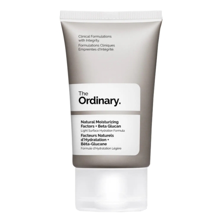 Un tube de 30 ml de The Ordinary Natural Moisturizing Factors + Beta Glucan présente la marque grise et blanche emblématique de The Ordinary et affiche des détails clairs sur le produit sur le devant. Dakar