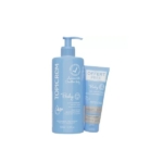 Deux flacons bleus de Topicrem Bébé Duo Lait Hydratant Protecteur 500 ml + Gel Lavant Doux 75 ml, tous deux debout avec un texte et des accents blancs, présentés sur un fond blanc. Dakar