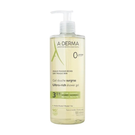 Un flacon pompe transparent de A Derma Gel Douche 3en1 Surgras Peaux Fragiles et Sèches 500 ml, avec une étiquette blanche et verte en français et en anglais, conçu pour les peaux sèches et fragiles. Dakar
