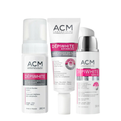 Le Coffret de Soin Anti-Tache Unifiant d'Acm comprend un Sérum Anti-Tâches, une Crème Intensive et une Mousse Nettoyante Éclaircissante, le tout dans un emballage blanc aux accents roses. Dakar