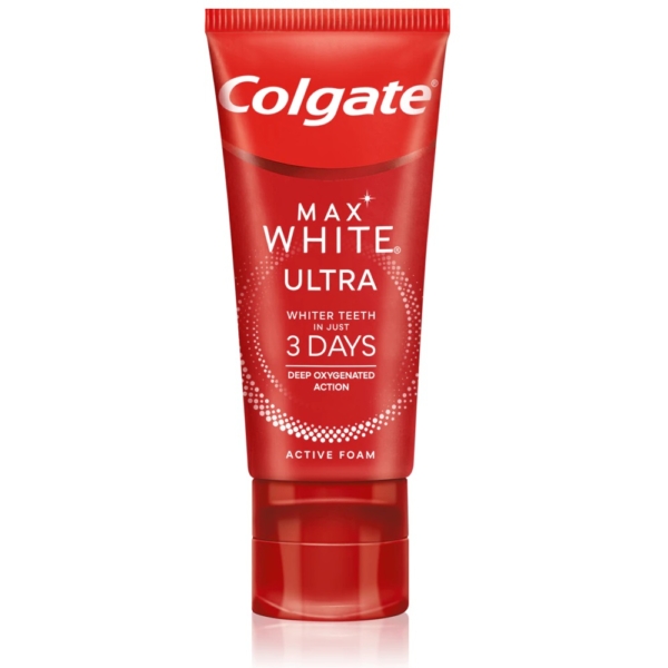 Un tube rouge de Colgate Max White Ultra Active Foam 50ml avec un texte blanc indiquant "Des dents plus blanches en seulement 3 jours" et "Une action oxygénée en profondeur", avec un bouchon à clapet et le logo de la marque Colgate Set sur le dessus. Dakar