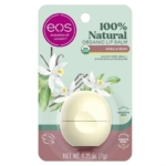 EOS Baume à Lèvres 100% Naturel Et Biologique Sphere Vanille 7g, dans un étui beige rond orné de fleurs de vanille blanches, met en avant sa formule 100% naturelle et certifiée USDA biologique. Dakar
