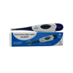 Un Gilbert Thermomètre Digital Rapide Flexible avec un capuchon bleu repose sur son emballage, affichant la marque "Gilbert" et indiquant qu'il s'agit d'un thermomètre digital rapide et flexible. Dakar
