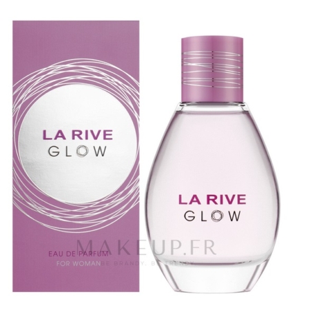 Un flacon de parfum La Rive Glow de 90 ml, transparent et doté d'un bouchon rose, se trouve à côté de son coffret rose et argenté assorti, tous deux affichant le nom de la marque et du produit bien en évidence au centre du flacon. Dakar