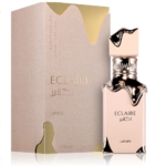 Le flacon de Lattafa Eclaire Eau de Parfum mixte 100ml se trouve à côté de son coffret beige et or, doté d'un élégant bouchon en or métallique et d'accents qui reflètent le style luxueux de Lattafa Khamrah Eau de Parfum mixte. Dakar