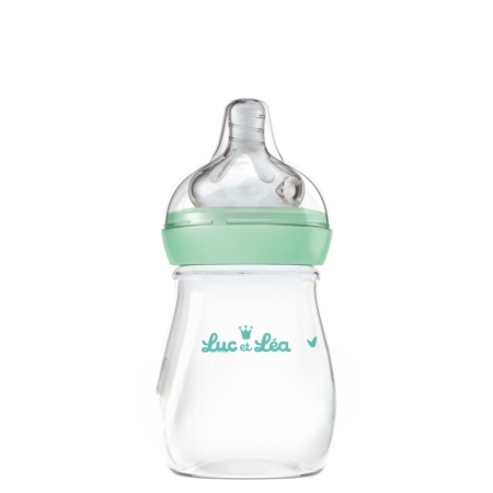 Le biberon Luc et Léa Ergosense Biberon Anti-Colique 150 ml Débit Lent 0 Mois et Plus est un biberon transparent avec une collerette verte, une tétine en silicone et le logo de la marque en sarcelle. Il permet de réduire les coliques et d'assurer le confort de votre bébé dès sa naissance. Dakar