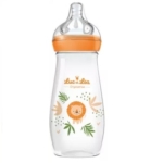 Le biberon transparent Luc et Léa Ergosense Anti-Colique 330 ml pour les 4 mois et plus, avec un bouchon et une tétine orange, est orné d'un joli lion en dessin animé et de feuilles vertes sur le côté. Le logo "Luc et Léa" apparaît au-dessus du lion en lettres orange et vertes. Dakar