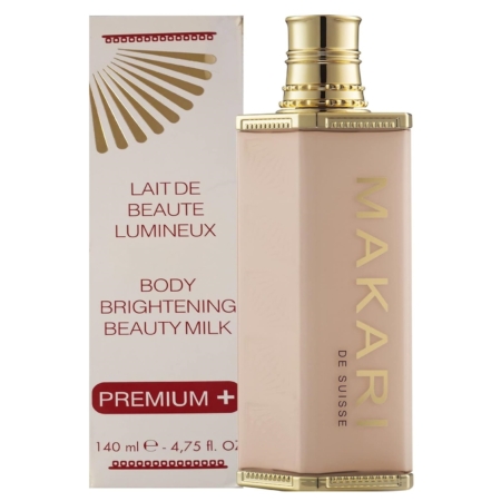 Un flacon rectangulaire à bouchon doré étiqueté "Makari De Suisse" se trouve à côté de son coffret, sur lequel figure le nom Makari Lait de Beauté Éclaircissant pour le Corps Premium Plus 140ml dans un élégant texte rouge et or. Dakar
